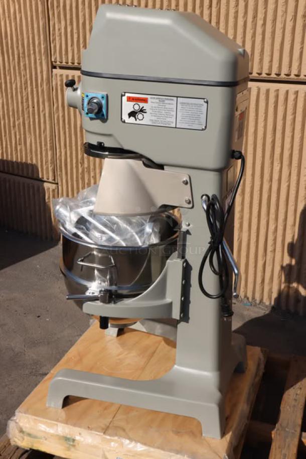 Brand new Globe SP30P 30 Qt. planetary floor pizza mixer, minor scratches, 1.5 hp, 240V, with guard & accessories.