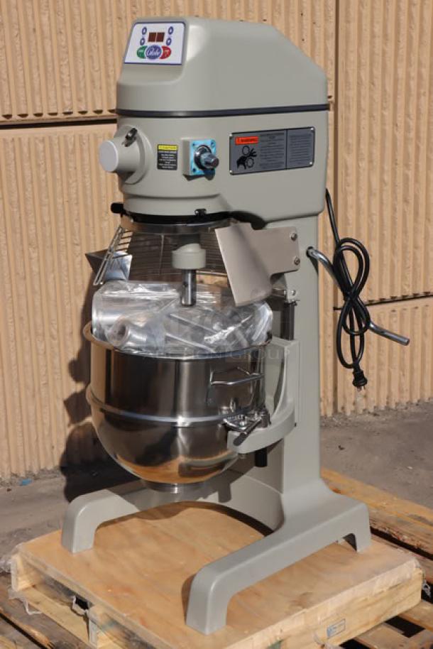Brand new Globe SP30P 30 Qt. planetary pizza mixer with guard, minor scratches, 1.5 hp, 240V, 12A, model SP30P.