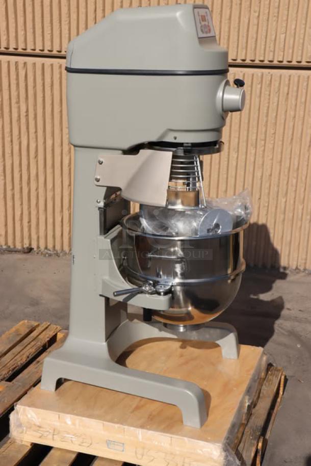 Brand new Globe SP30P 30 Qt. planetary floor pizza mixer with guard, minor scratches, 1 1/2 hp, 240V, 12A, on pallet.