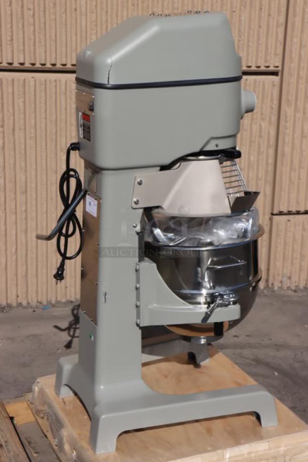 Brand new Globe SP30P 30 Qt. Planetary Pizza Mixer, minor scratches, complete with guard and standard accessories.