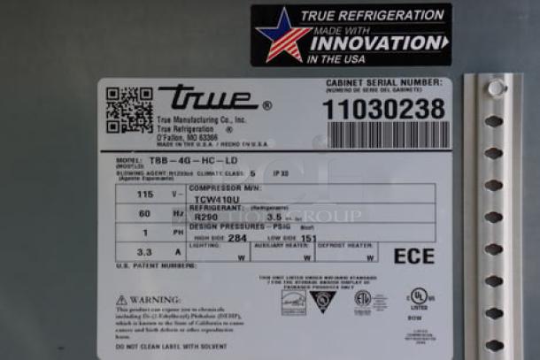True TBB-4G-HC-LD bar refrigerator label, serial 11030238, 115 volts, 2.8 amps, 1 phase; right glass pane broken.