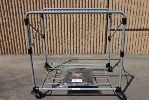 Rubbermaid® 1881750 Laundry Cart, 8 Bushel, collapsible, vinyl bag included, on casters. New, out of packaging.