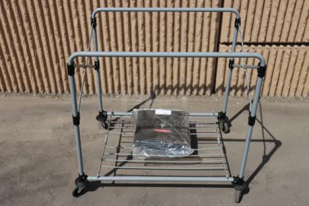 Rubbermaid 1881750 Laundry Cart, 8 bushel, collapsible, on casters, includes vinyl bag in plastic, brand new, out of packaging.