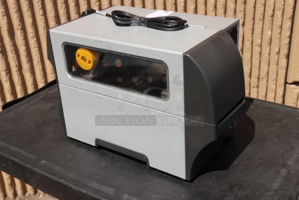 Zebra ZT411 Industrial Barcode Printer, model ZT41142-T410000Z, gray, power cord included, good condition.