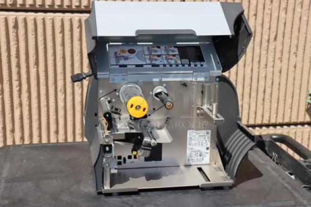 Zebra ZT411 Industrial Barcode Printer, model ZT41142-T410000Z, open view showing internal mechanisms, serial number 99J242802106.