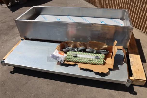 Brand new Eagle Group PCP-4 mobile ice-cooled cold food table with galvanized undershelf, unassembled. Scratch-n-dent condition.