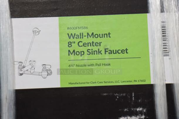 Brand new Regency 600SMC25SD stainless steel mop sink cabinet, 25 1/4"x22 5/8"x84", includes 8" faucet. Label shows item details.