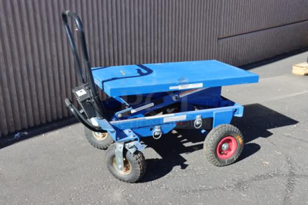 Brand new Vestil CART-PN-1500 blue steel hydraulic cart, dented top, seized wheels, 1,500 lb capacity, S/N: S2630836-1.
