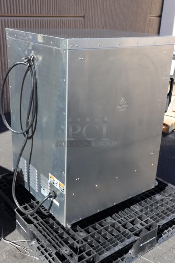 Brand new 2024 Metro C515-CFC-4 half-size holding/proofing cabinet, clear door, 120V, 2000W, 16.7A, slight dents visible.