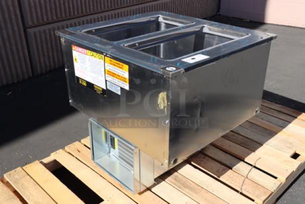 BRAND NEW Delfield N227P 12-Gallon Drop-In Freezer with stainless steel lids, minor dent on right side panel. Model: N227P.