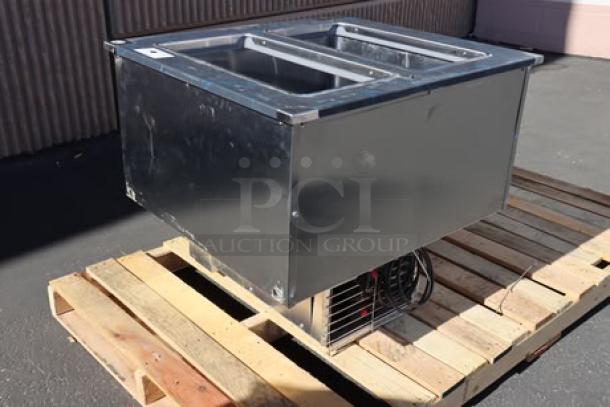 Brand new Delfield N227P 12-gallon drop-in freezer, stainless steel lids, 115V, 2.9A, 1-phase, minor side dent.