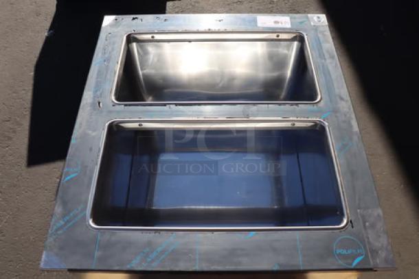 BRAND NEW Delfield N227P 12 Gallon Drop In Freezer with stainless steel lids; minor dent on right side panel. Serial: 2504820100130.