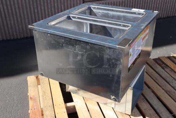 Delfield N227P 12 Gallon Drop-In Freezer, stainless steel lids, 115V, 2.9 Amps, minor dent on right side panel, new condition.