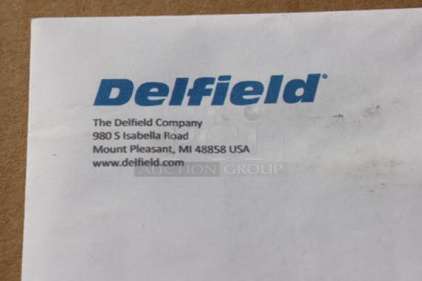 Delfield label with company address and website printed in blue text.