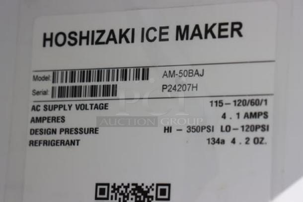 Hoshizaki AM-50BAJ ice machine label shows model, serial number P24207H, voltage, amperes, and refrigerant details.