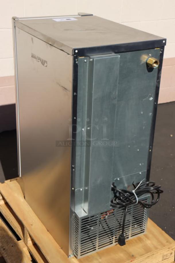 Brand new Hoshizaki AM-50BAJ ice machine, 51 lb. capacity. Out of original packaging; minor parts may be missing. Serial: P24207H.