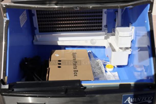 Hoshizaki AM-50BAJ ice machine, new, with dents on top, possible door frame and mount damage, spare parts included.