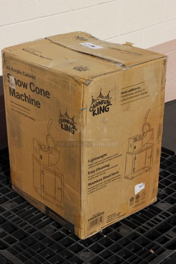 Carnival King SCM250 Sno Cone Machine in sealed box, new condition. Packaging shows no significant damage.