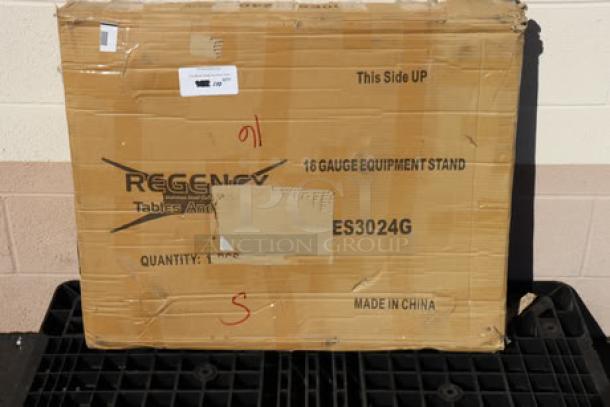Regency 600ES3024G 30"x24" equipment stand in original box. Box shows slight wear. Includes stainless steel and galvanized parts.