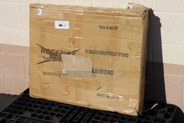 Regency 600ES3024G 30" x 24" stainless steel equipment stand in original packaging, scratch-n-dent condition.