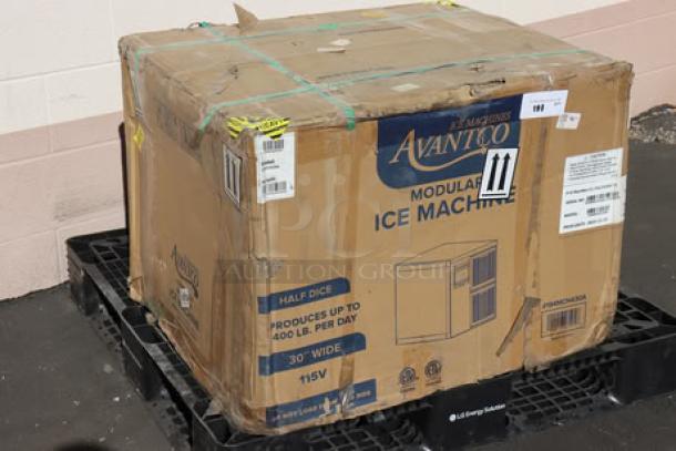 Box containing a new Avantco MC-H-430-A ice machine, 30" wide, 400 lb capacity, 115V, still in box despite visible wear. 