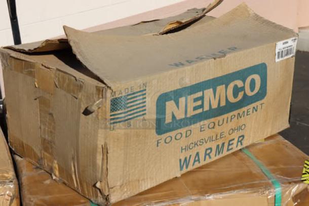 Nemco 6055A countertop food warmer box, brand new, 1200W, 120V, slight box wear, serial number 24062532 visible.