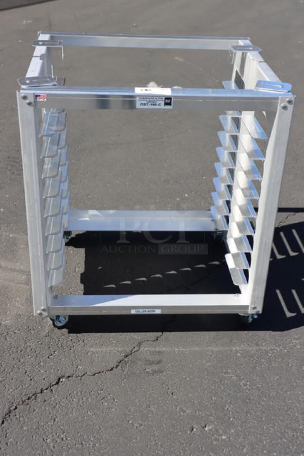 BRAND NEW Cadco OST-195-C heavy-duty aluminum oven stand with casters, shelf slots visible, designed for full-size convection ovens.