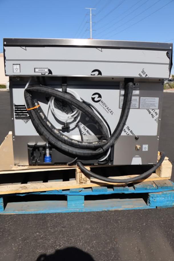 BRAND NEW Cadco XAF-193 convection oven on pallet; outer glass pane broken; tags with model, voltage, serial number visible.