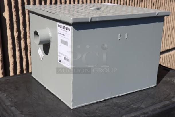 Brand new Zurn Elkay GT2700-15-2NH grease trap, 30 lb. capacity, 15 GPM, with 2" no-hub connections, out of packaging.