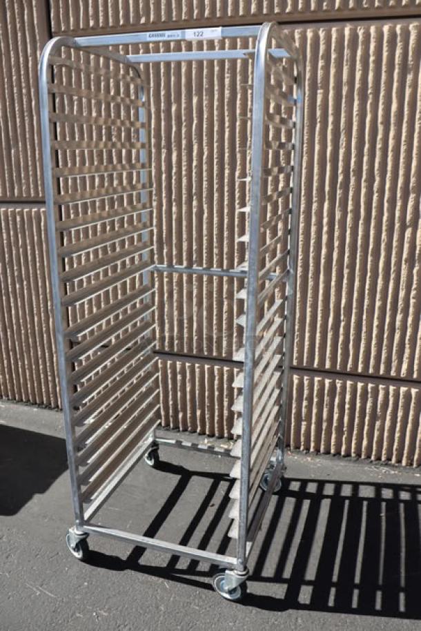 Brand new Channel SSPR-3S stainless steel pan rack, 38 side load pans, with a bend, on casters, ready for use.