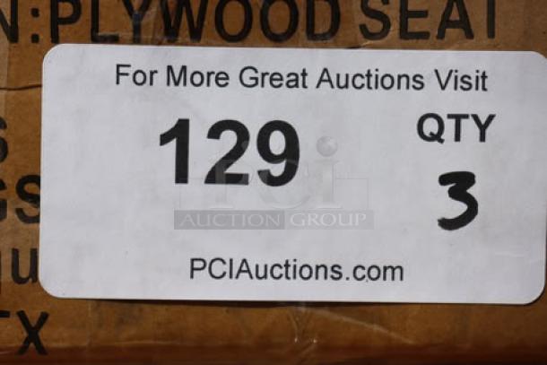 Alt text: "Label on carton indicating auction item number 129, quantity 3, from PCIAuctions.com."
