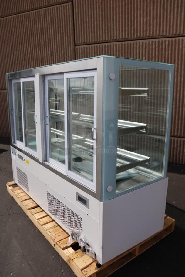 Avantco BCF-72-HC 70 7/8" white refrigerated bakery display case with square glass, 115V, minor marks, new condition.
