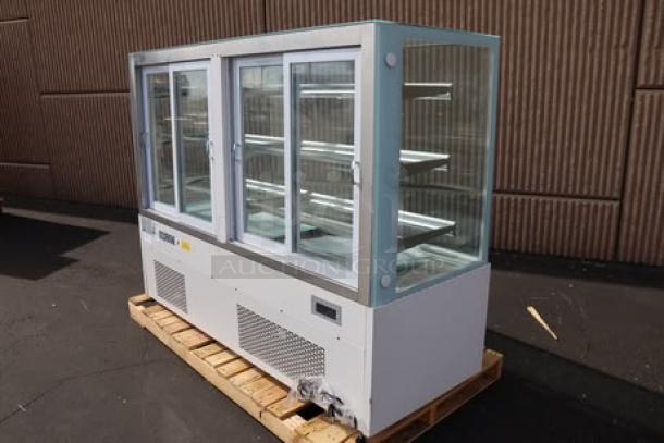 Avantco BCF-72-HC white refrigerated bakery display case, 70 7/8" square glass, 115V, minor scratches, dents possible.