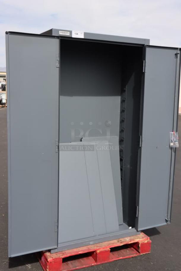 Brand new Durham Mfg 2500-4S-95 36"x24"x84" steel storage cabinet with 4 shelves, shown open with some scratching.
