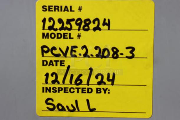 Yellow inspection label for Imperial Range PCVE-2 oven. Serial #12259824, inspected on 12/16/24 by Saul L.