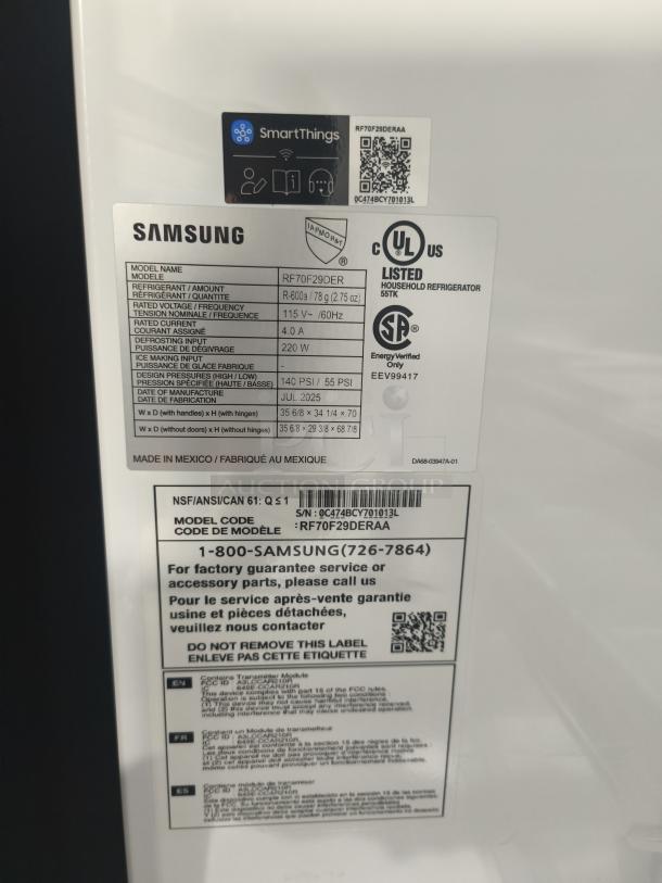 Samsung 29 cu ft 4-Door French Door Refrigerator, model RF70F29DER, with labels detailing specs and SmartThings QR code.