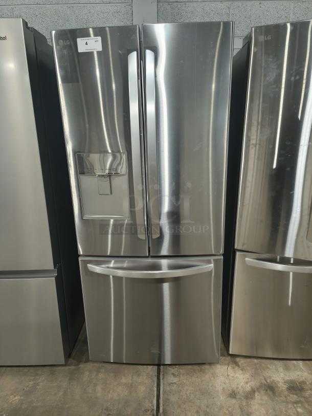 Brand new LG 22 cu ft French Door Refrigerator, stainless steel, with water/ice dispenser. Scratch and dent condition.