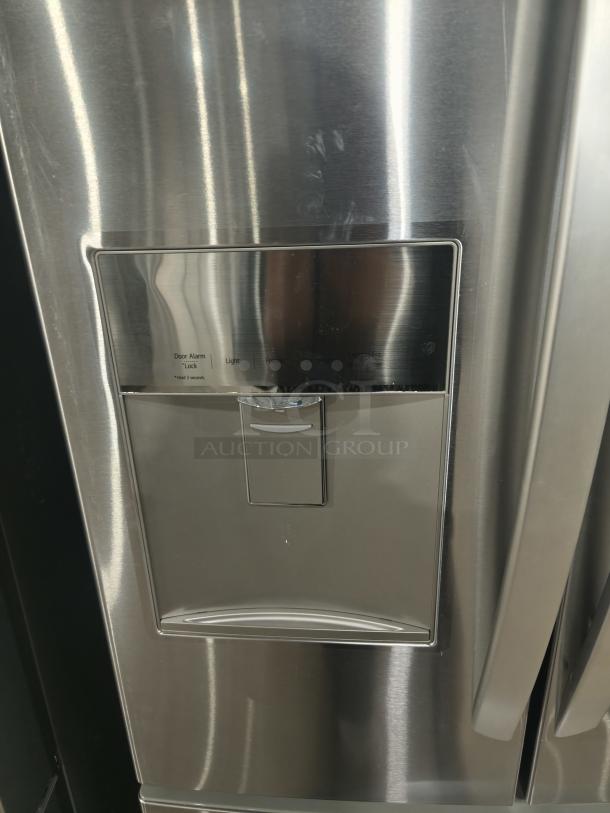 Brand new LG 22 cu ft French Door Refrigerator, model LFDS22520S, with water/ice dispenser. Scratch and dent condition.