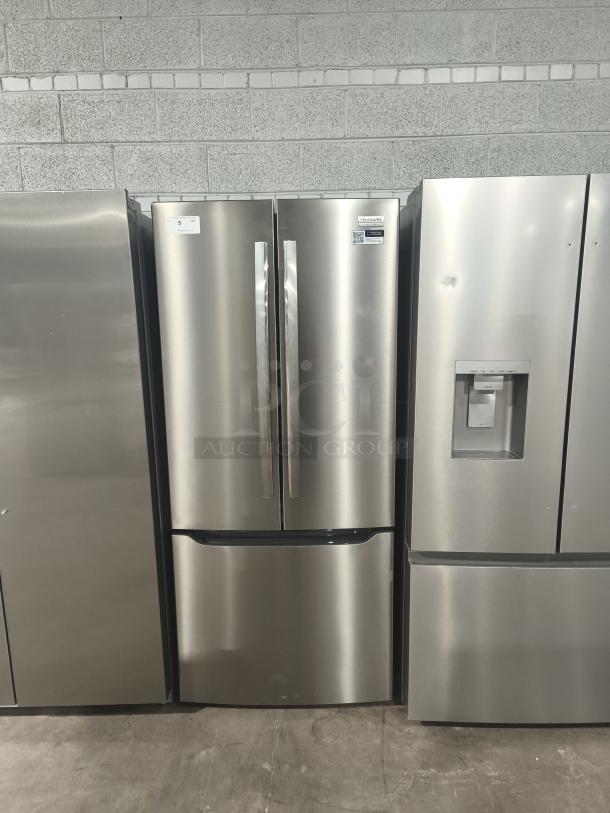 NEW Frigidaire Gallery French Door Refrigerator, 20 cu ft, model GRFN2023AF00, in stainless steel finish.
