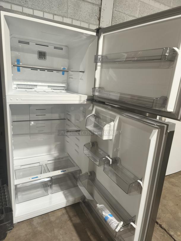 NEW Midea 18.1 cu ft top-freezer refrigerator, model MRT18D3BST, featuring spacious shelves, clear bins, mint condition.