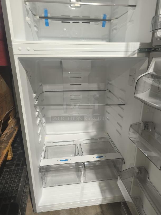 Midea MRT18D3BST top-freezer refrigerator, 18.1 cu ft, new condition. Features glass shelves and clear drawers.