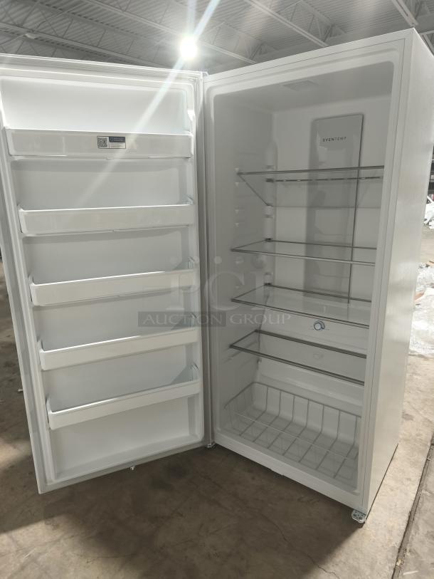 NEW Frigidaire 20 cu. ft. garage-ready upright freezer, model FRUF2020AW. Features adjustable shelves and door storage.