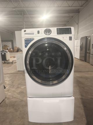 GE 4.8 cu ft Smart Front Load Washer, model GFW550SSN2WW, white, excellent condition, visible control panel and vent system label.