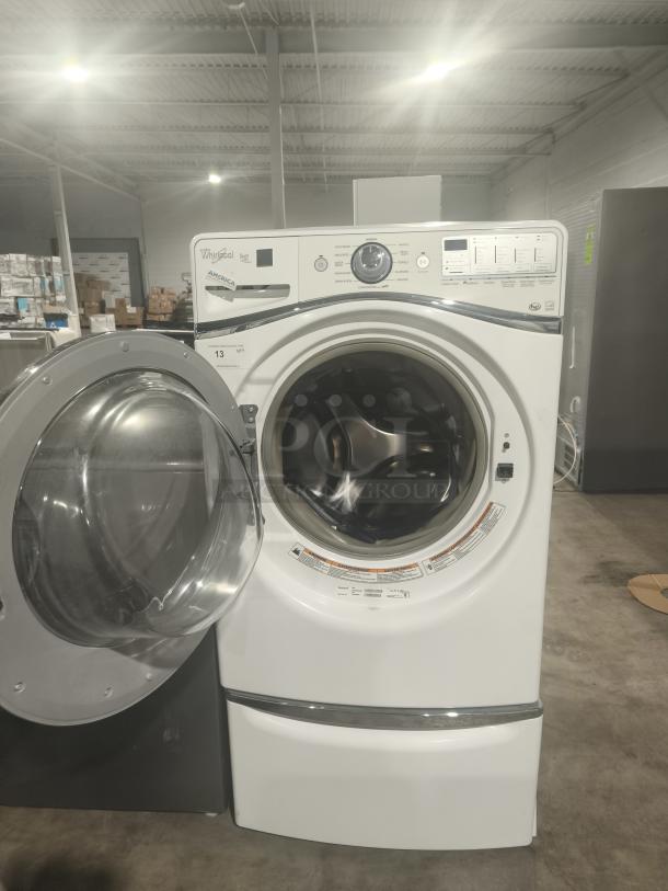 Whirlpool Duet® Steam Front Load Washer, model WFW94HEAW, in good condition. Open door shows the drum and control panel.