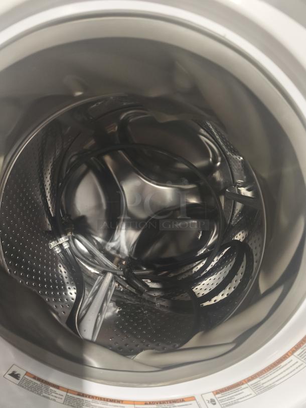 Whirlpool Duet® Steam Washer, model WFW94HEAW, interior view showing stainless steel drum.