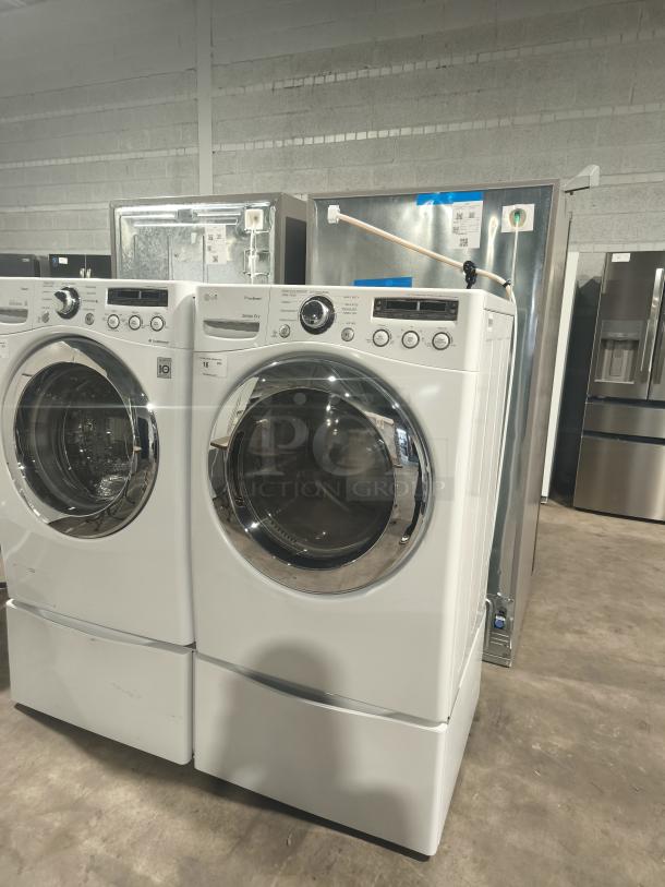 LG 7.3 cu ft Ultra-Large Capacity SteamDryer, model DLEX2650W, white, front-loading, excellent condition.