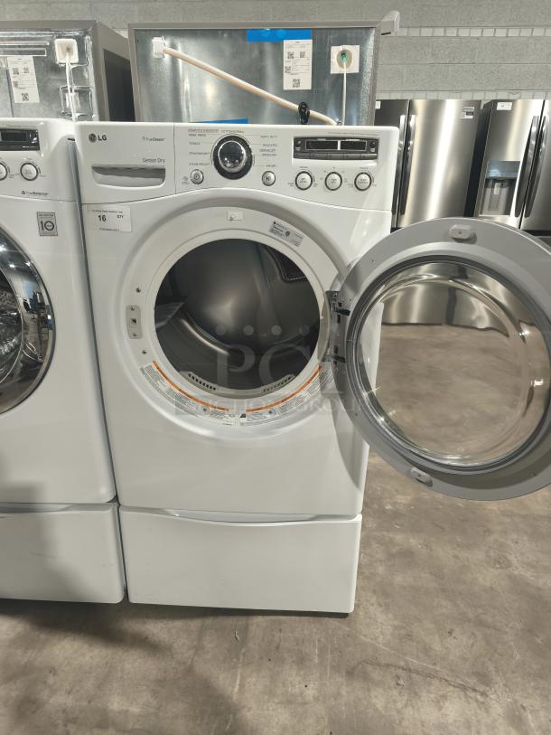 LG 7.3 cu ft Ultra-Large Capacity SteamDryer, Model DLEX2650W. Open door, control panel visible, excellent condition.
