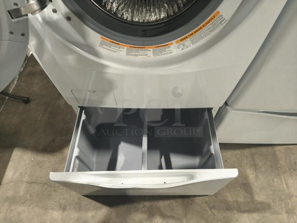 LG WM2650HWA SteamWasher™ Front-Load Washer, white, tested, working, open door, visible interior, model label.