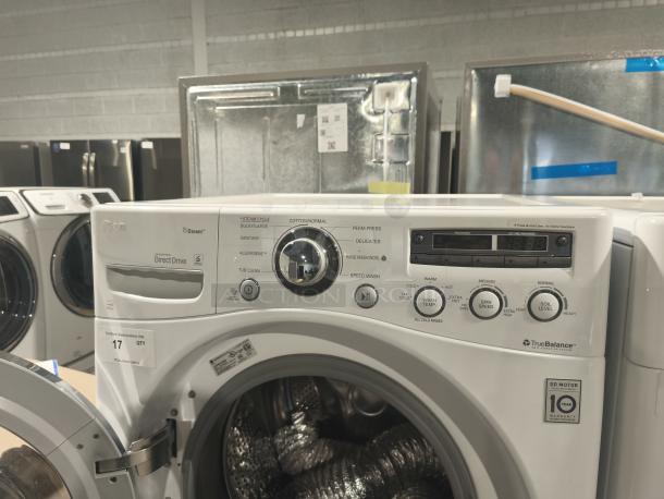 LG WM2650HWA SteamWasher™ front-load washer, white, tested and working. Features steam cycle, digital controls, 10-year motor warranty.