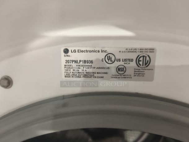 LG WM2650HWA SteamWasher™ label, showing model, UL and ETL certifications, and energy performance specs.